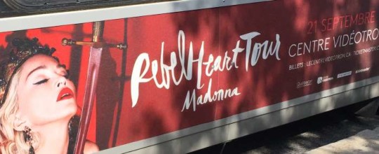 Rebel Heart Tour ad in Quebec City